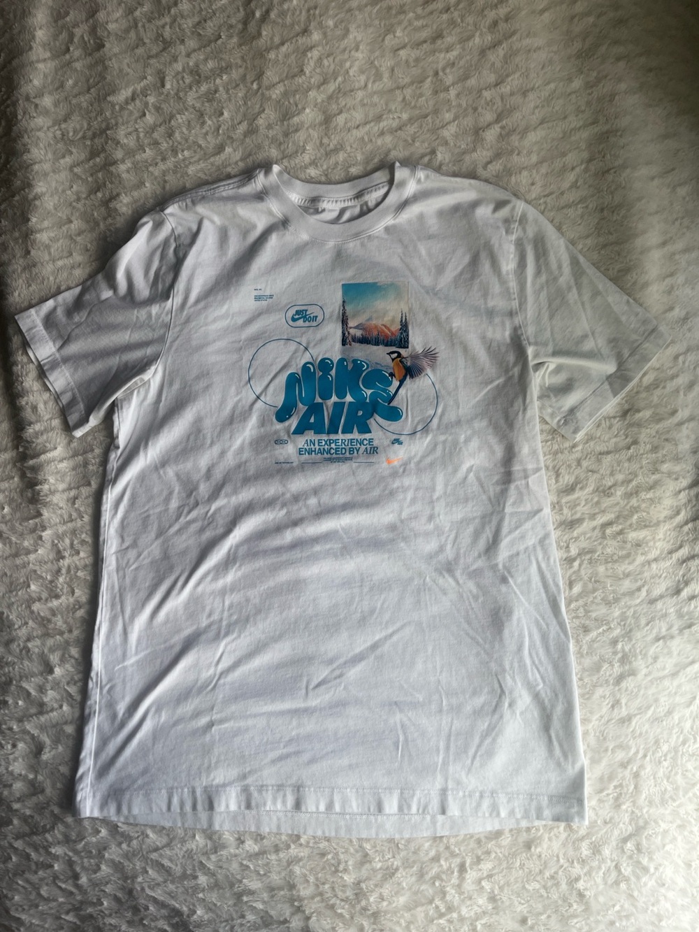 Nike White Tee with Blue Script and Orange Accent